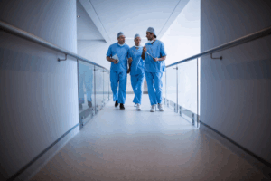 Doctors in scrubs walking